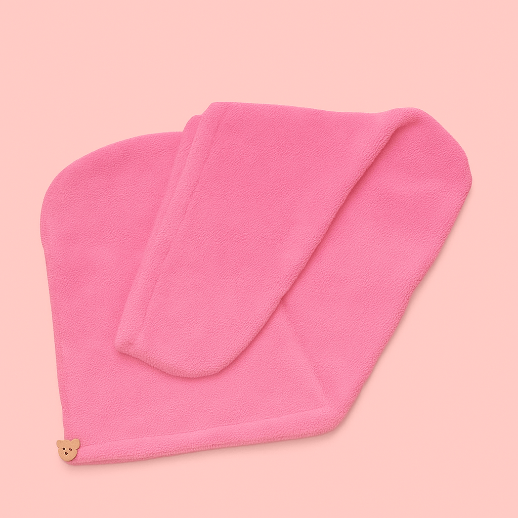 Crown Wash Microfibre Hair Wrap in soft pink color, designed for fast drying and frizz reduction after hair washing.