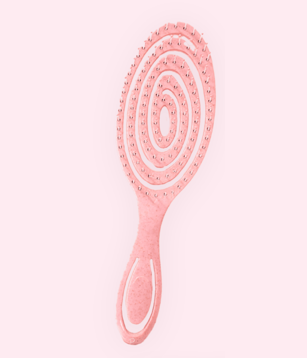 Crown Wash Wet n Dry Flexi Brush in pink color featuring a flexible loop design for pain-free detangling.
