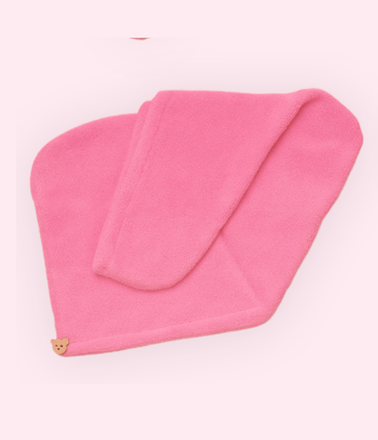 Crown Wash Microfibre Hair Wrap in pink color, designed to dry hair faster and reduce frizz while protecting it.