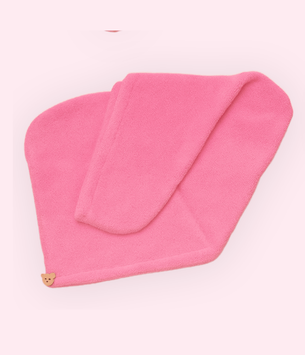 Crown Wash Microfibre Hair Wrap in pink color, designed to dry hair faster and reduce frizz while protecting it.