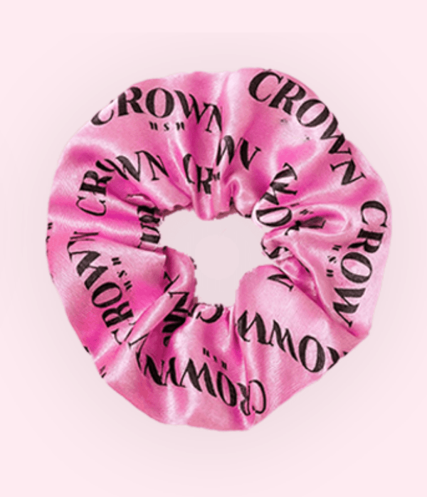 Satin Scrunchie in soft pink satin featuring CROWN WASH logo, perfect for frizz-free styling and a luxurious finish.