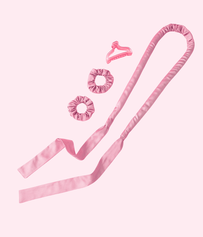 Heatless Curl Kit featuring a silky satin tool, scrunchies, and a hair clip for effortless curls without heat.