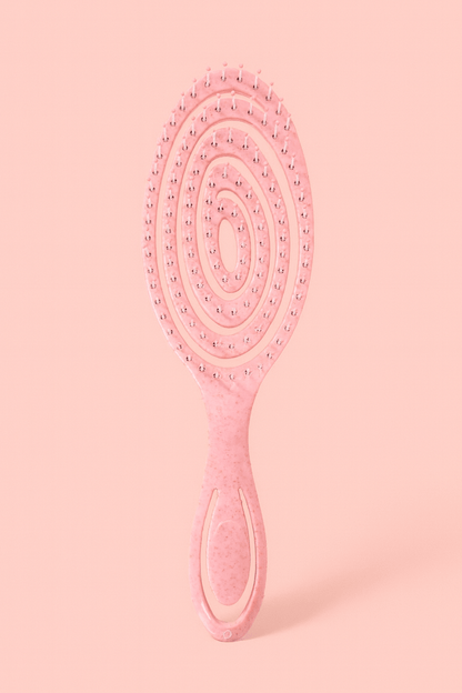 Crown Wash Wet n Dry Flexi Brush in pink designed for painless detangling and everyday use.